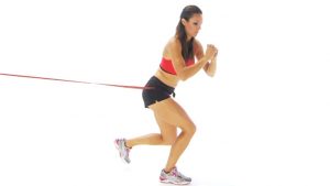 Knee exercise - resistance band hopping