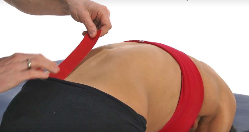 Preventing back pain Kinesiology taping